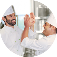 GOURMET Köche geben sich ein High-Five